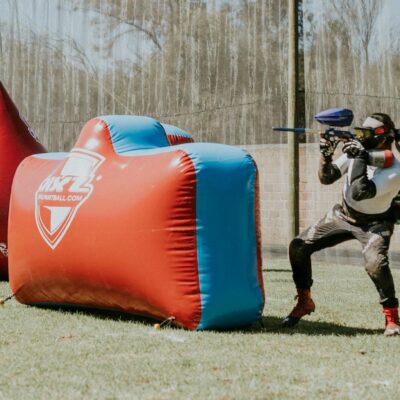 Person Shooting with Paintball Rifle