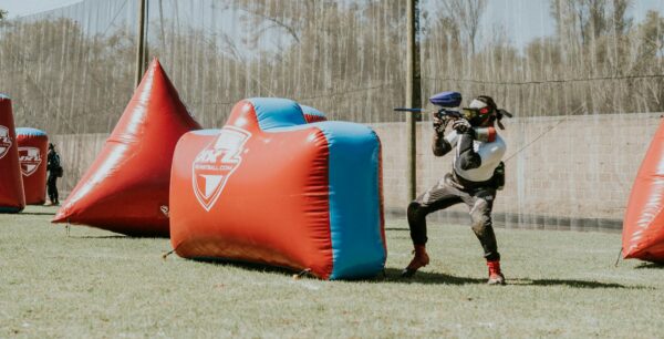 Person Shooting with Paintball Rifle